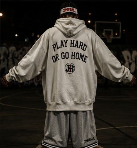 Player walking off a floodlit court at night